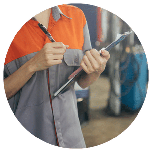 auto repair shop employee with clipboard