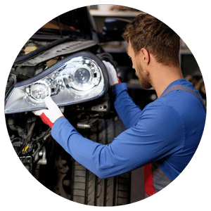 technician working on car light